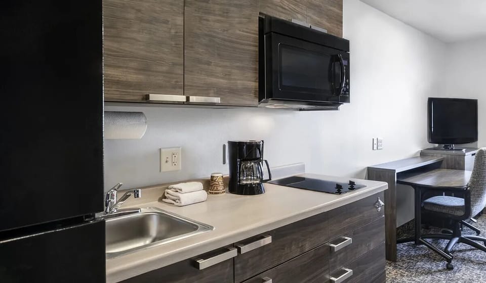 Cook simply with stovetop, microwave, and coffee ready to go.