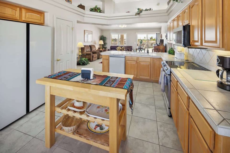 The open, airy kitchen offers ample space & all the comforts of home. 