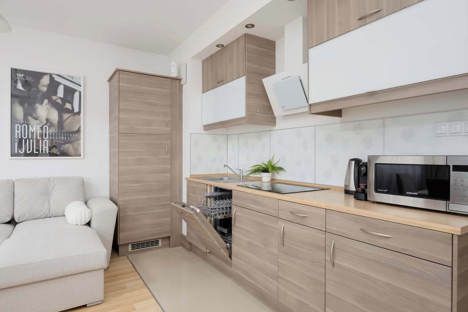 Open-plan kitchen and living room with modern finishes
