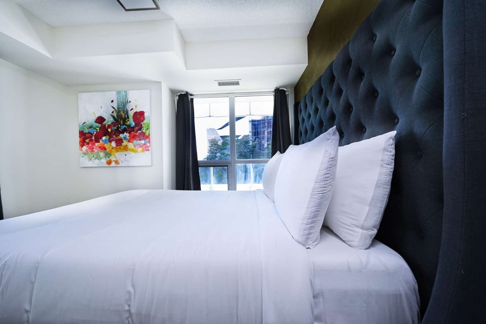 A peaceful bedroom with a comfortable bed, designed for a restful night.