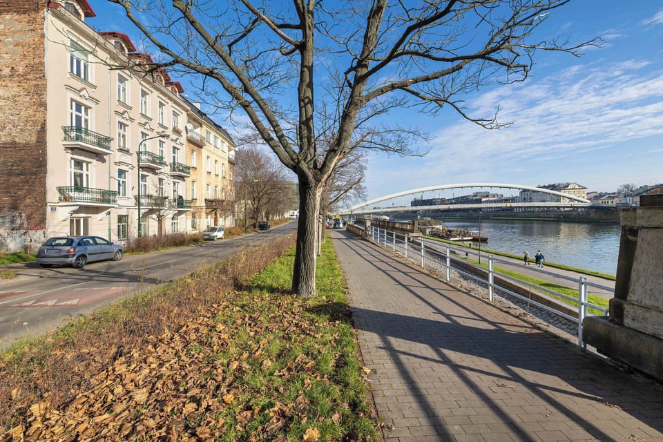 A contemporary building near scenic riverside paths, perfect for walking and cycling along the Vistula.