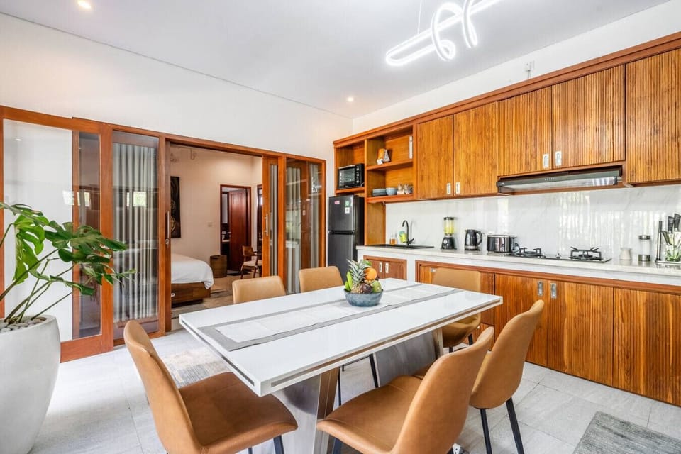 Dining area with natural light and modern finishes