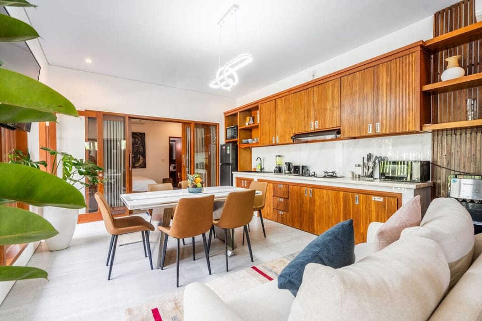 Open-plan kitchen and sofa area