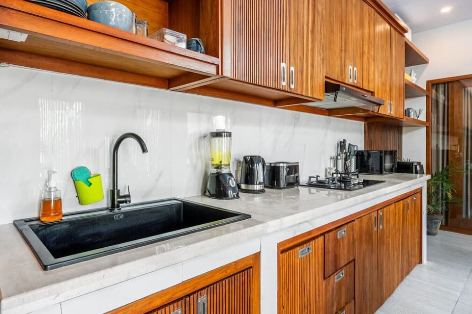 Fully equipped kitchen with modern appliances