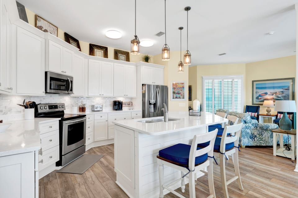 The kitchen island offers bar seating
