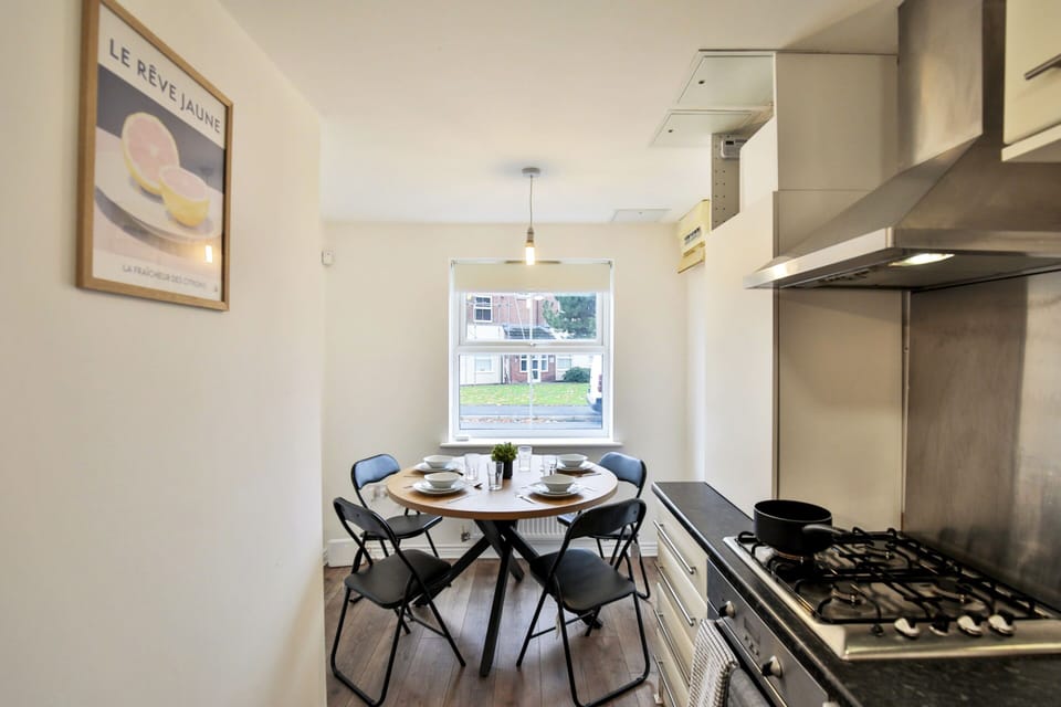 Kitchen has a dining areas for 4 people. 
