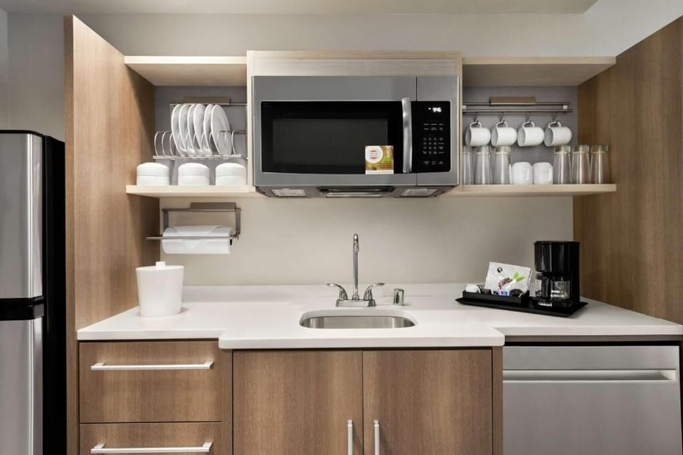 Enjoy easy meals with stocked kitchenette, microwave, and coffee maker