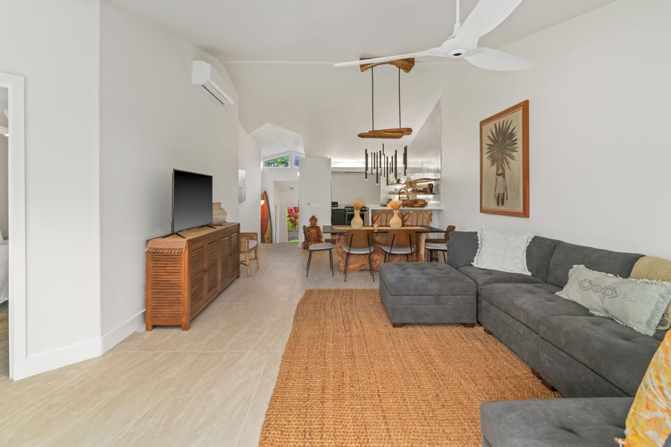 Relax and reconnect in this airy space with cozy seating and garden views.