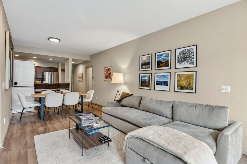 Spacious living room with fireplace, smart TV, and gorgeous views