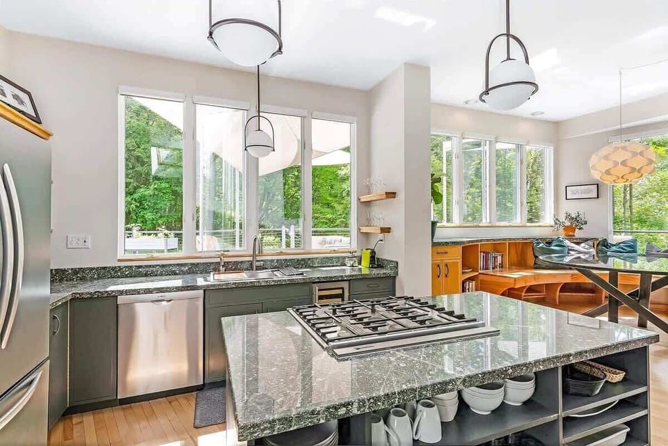 Fully stocked kitchen with island and pantry.