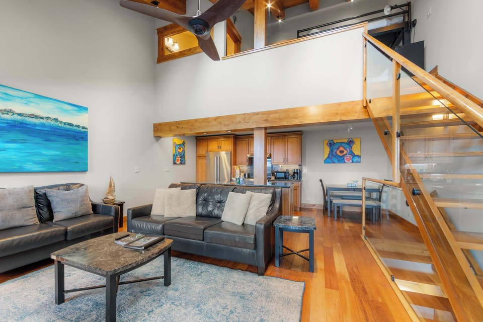 Living room with loft access 