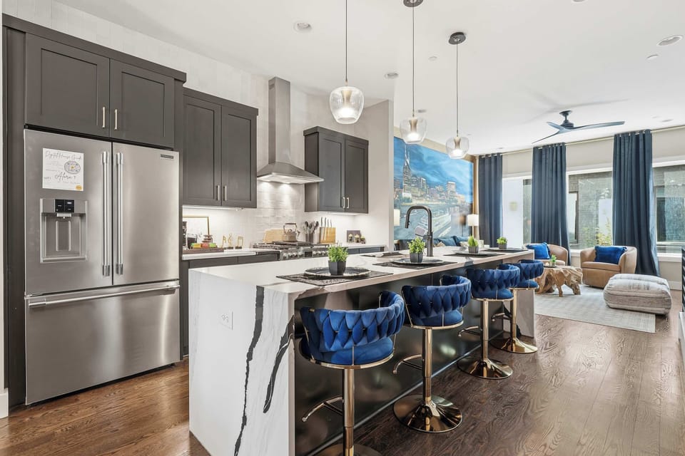 Gourmet Kitchen with Stainless Appliances and Island Seating