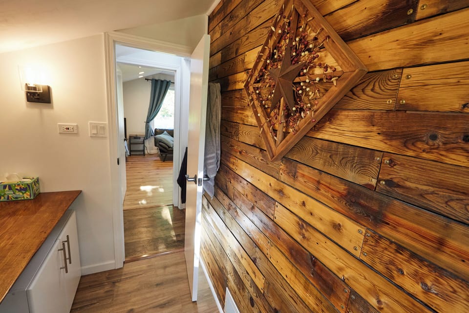 Upper level half bathroom wall.