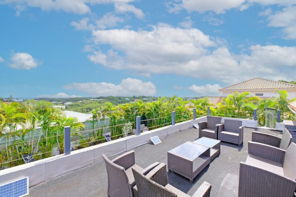 In Le Gosier, Villa Tinea is a contemporary villa overlooking the Dampierre valley. You'll love the pool and the roof top as you watch the sun set over the Caribbean Sea