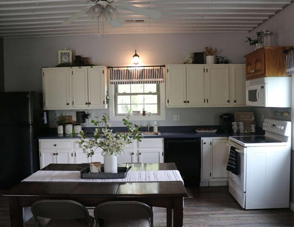 Sit and enjoy a homemade meal at the 4-seater dining table.