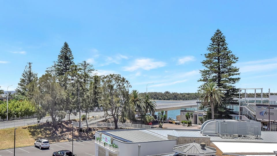 Sunny outlook capturing greenery and the sparkling coastline