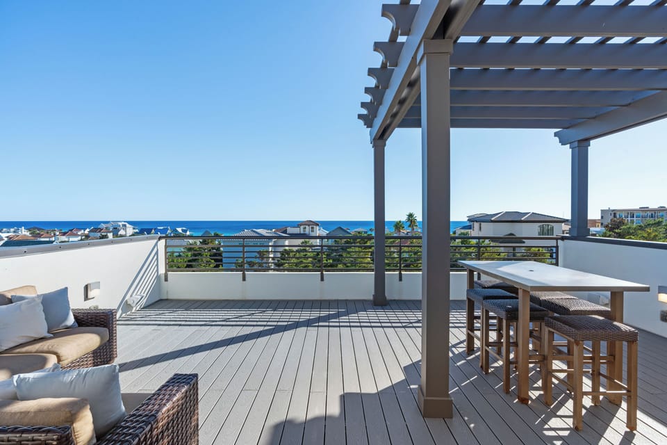 Private rooftop terrace with sweeping Gulf views — your 30A sunsets start here.