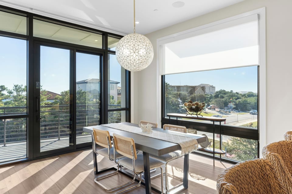 Dine with outdoor views and easy access to the balcony.