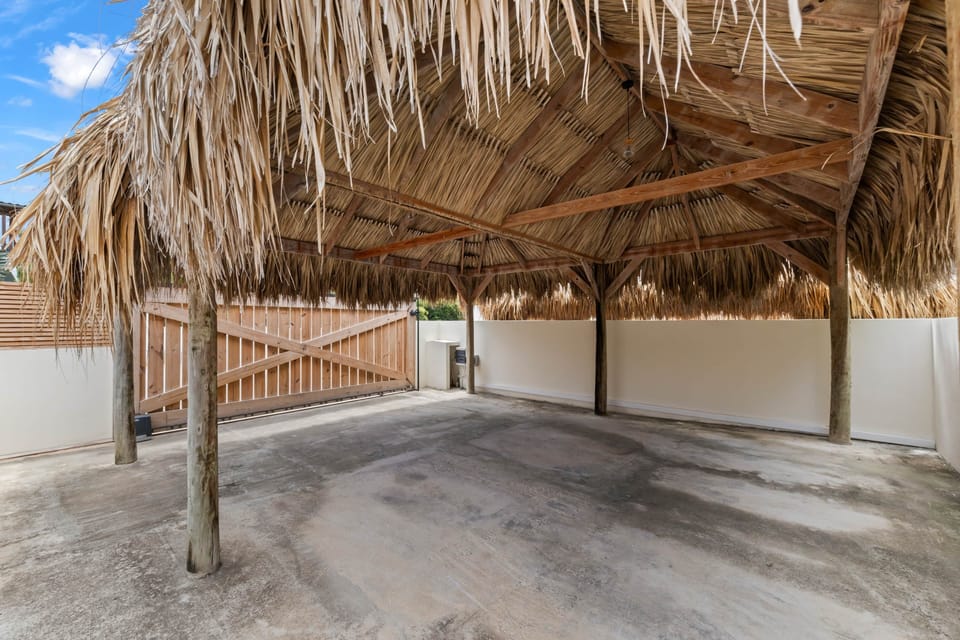 Parking space on private property under a palapa