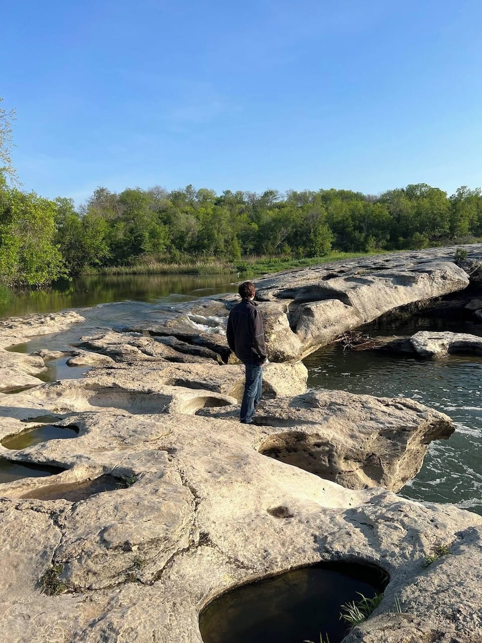 Exploring the rugged beauty of McKinney Falls Park . Perfect for a peaceful retreat into nature's embrace. 