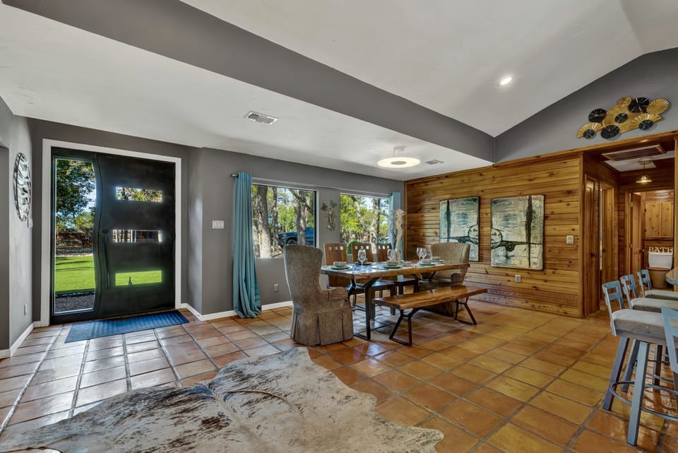 Inviting dining space with scenic Wimberley views — perfect for meals with family and friends.