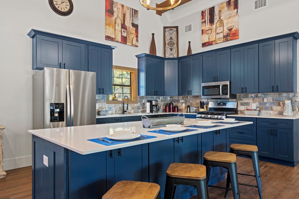 Gourmet Kitchen: Craft culinary delights in this stylish, open-concept kitchen with natural light!