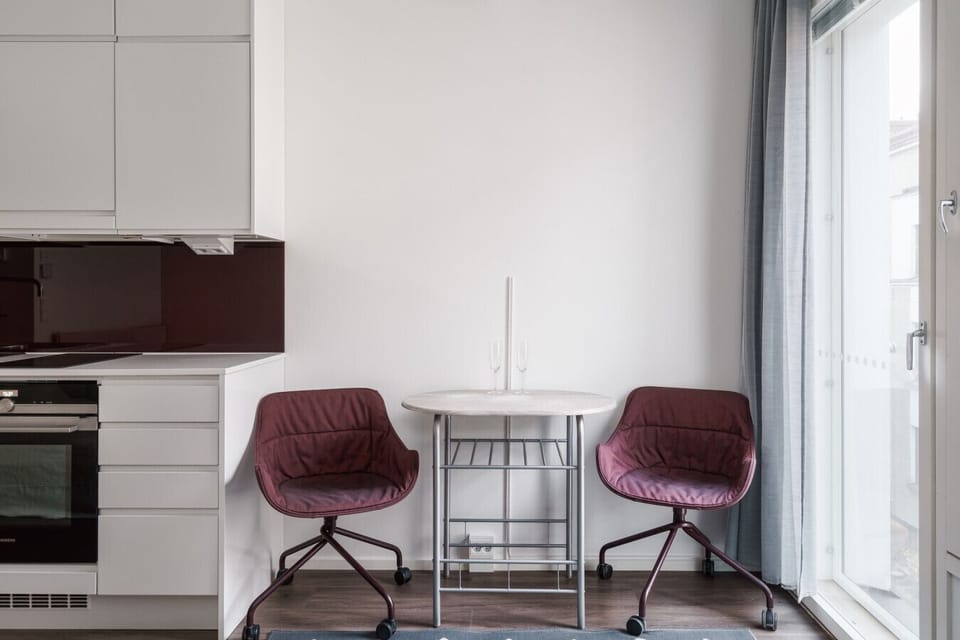A snug sitting area for two — ideal for dining, chatting, or relaxing.