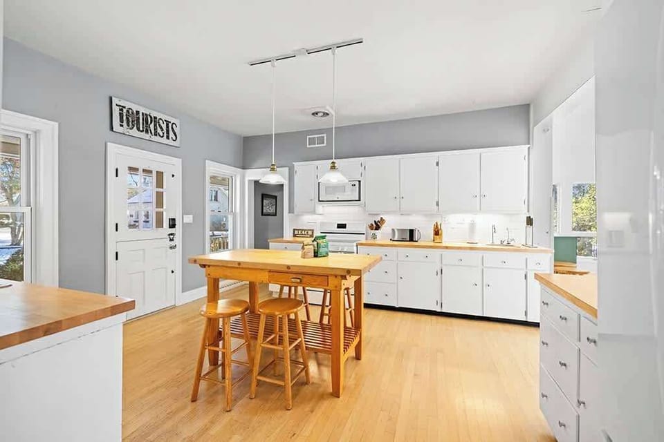 Gather for breezy breakfasts and easy cooking in The Farmhouse kitchen.