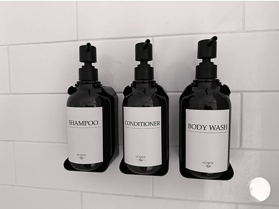 Shampoo, conditioner and body wash provided in shower