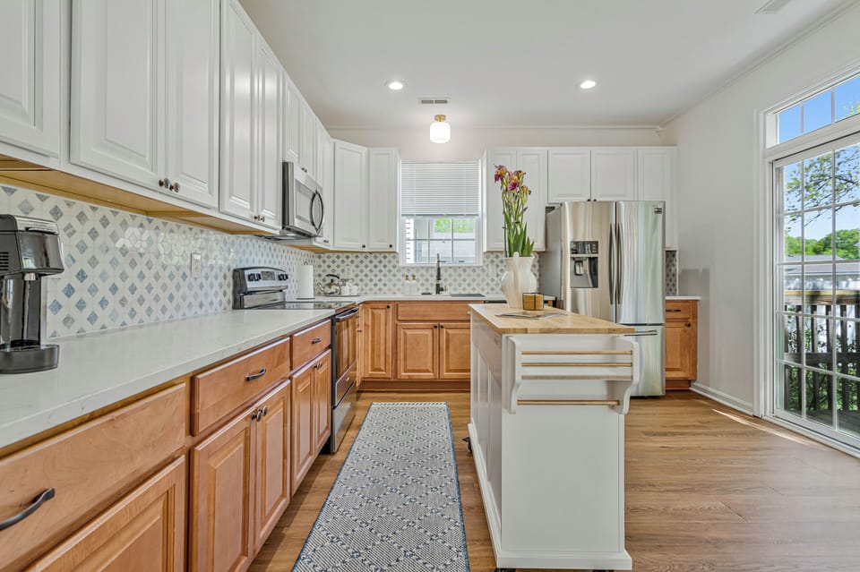 Full featured large kitchen with every amenity! Movable island & all appliances.