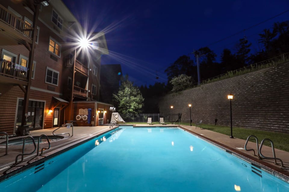 Tranquil poolside ambiance at night, creating the perfect setting for unwinding under the stars.