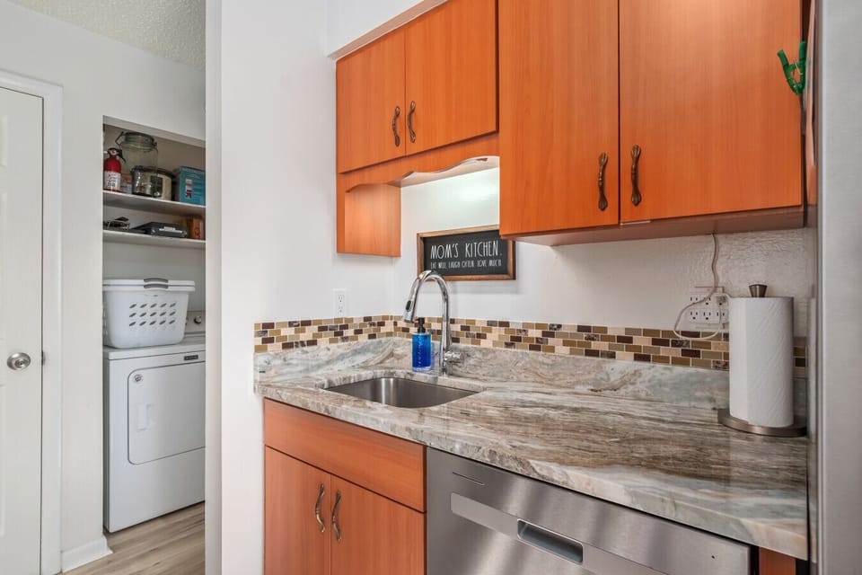 Kitchen | Fully equipped with stainless steel appliances and ample counter space