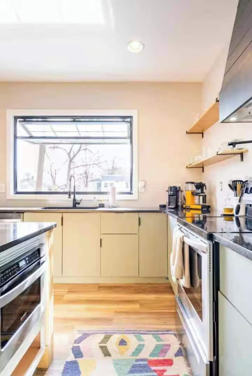 Fully equipped kitchen with full-size appliances for cooking at home between Ponce City Market meals