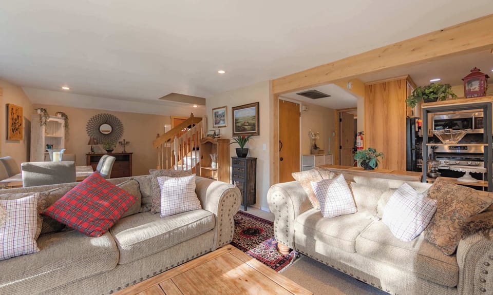 Cozy living area with Smart TV, and wood burning fireplace