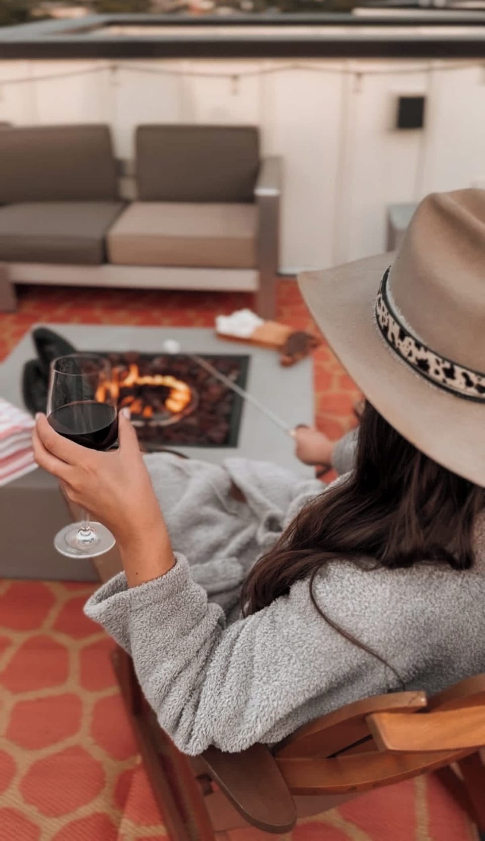 Rooftop Retreat: Savor evenings by the fire with stunning city views and a glass of wine!