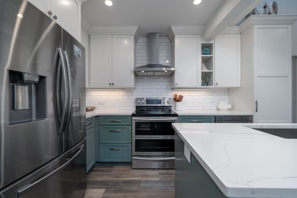 The kitchen feels both luxurious and lived-in blending elegance with warmth.
