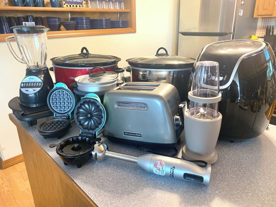 Fully stocked kitchen with griddle,toaster, blender, air fryer,crock pots & more