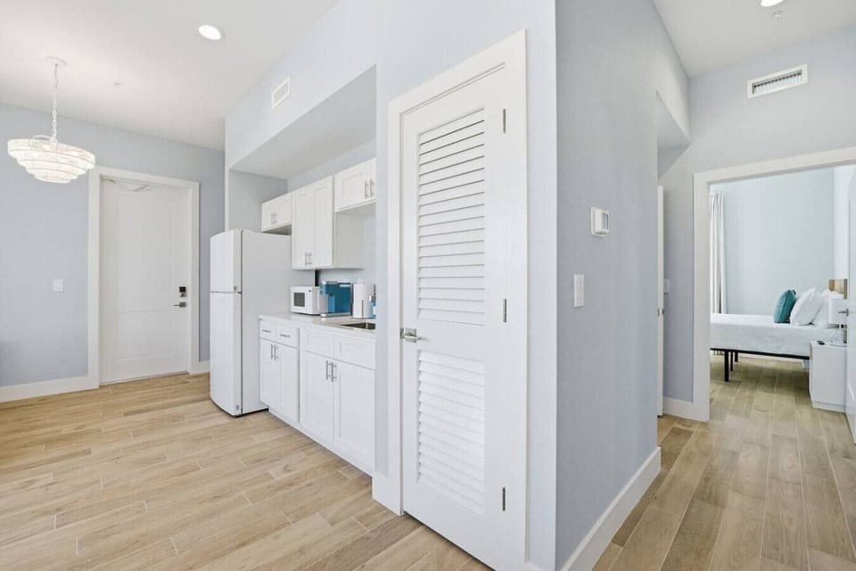 Modern kitchenette with sleek finishes and thoughtful touches