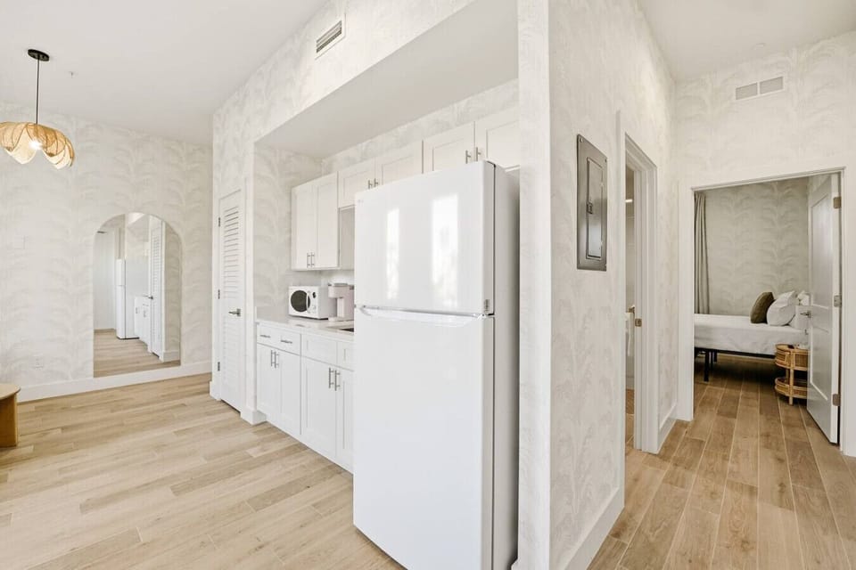 Modern kitchenette with sleek finishes and thoughtful touches