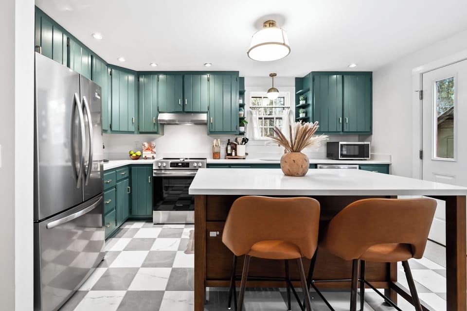 Fully equipped kitchen with a large island—perfect for cooking and gathering.