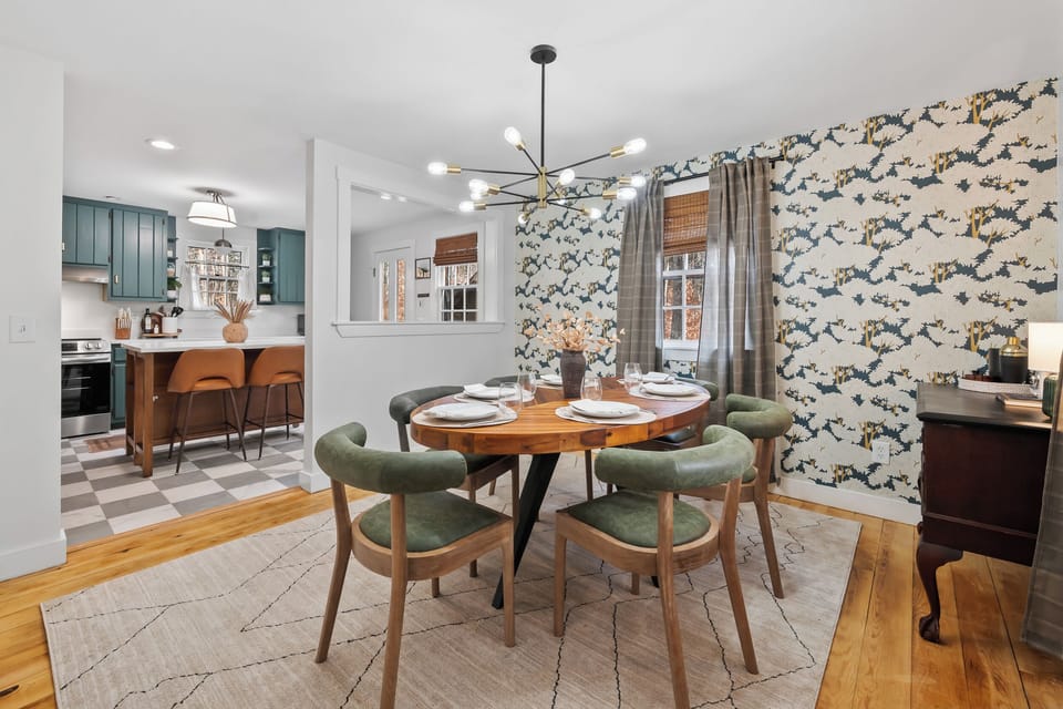 Bright dining room visible from the kitchen, ideal for gatherings.