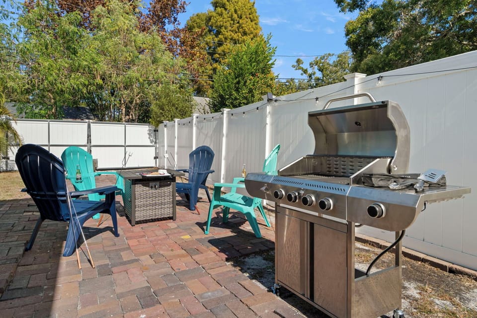 Fire up the grill & dine outdoors - shaded table with built-in lighting.