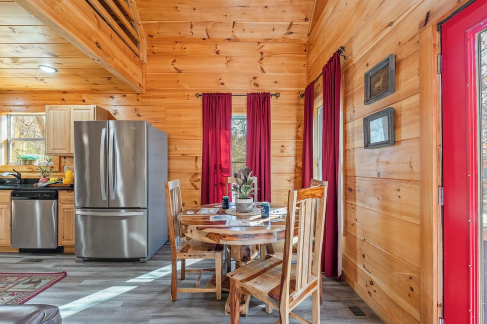 Cozy dining nook with warm wood interiors, perfect for shared meals and morning coffee.
