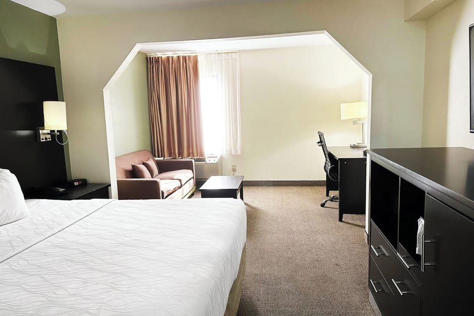 Stretch out in an airy suite with desk for easy workdays.