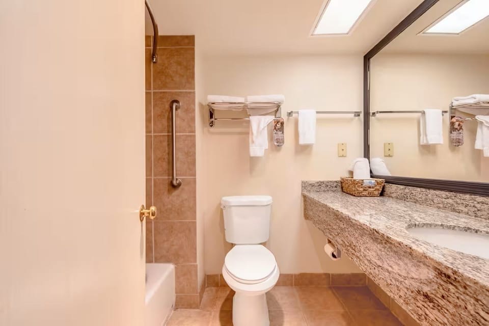 Wake up gently in a bright room made for rest.