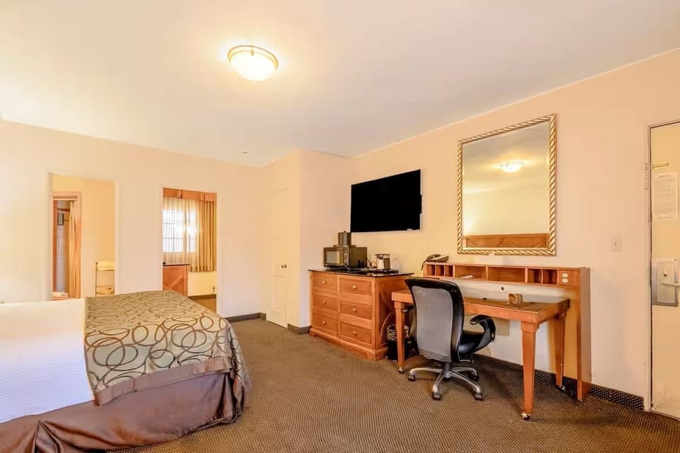Settle in with a dedicated work desk and large TV.