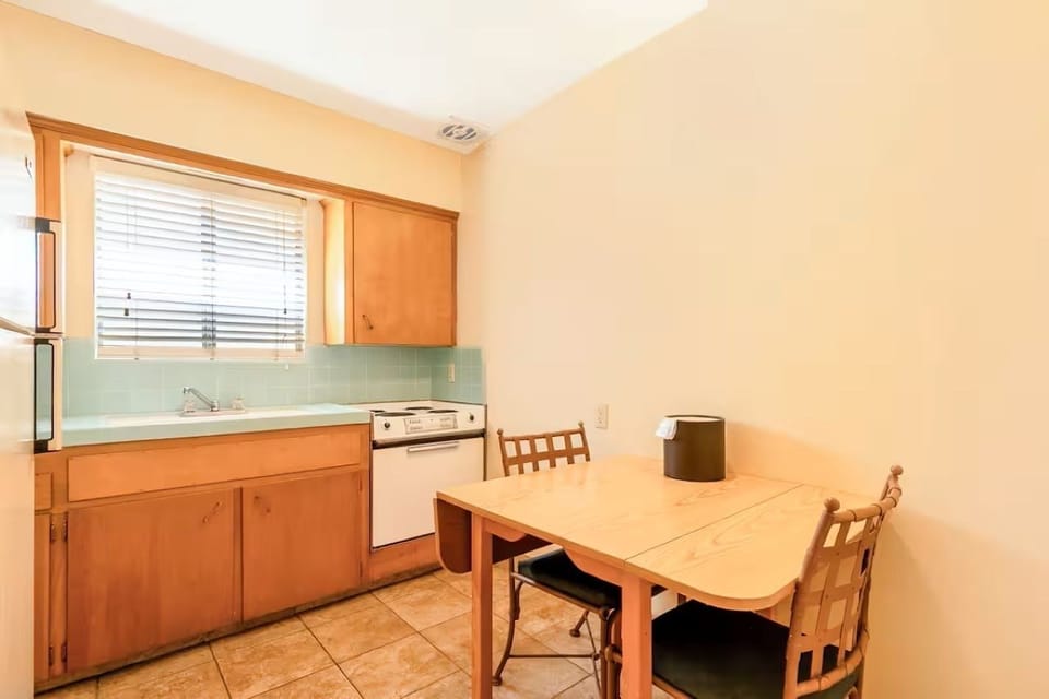 Enjoy relaxed meals together at the in-room dining table.