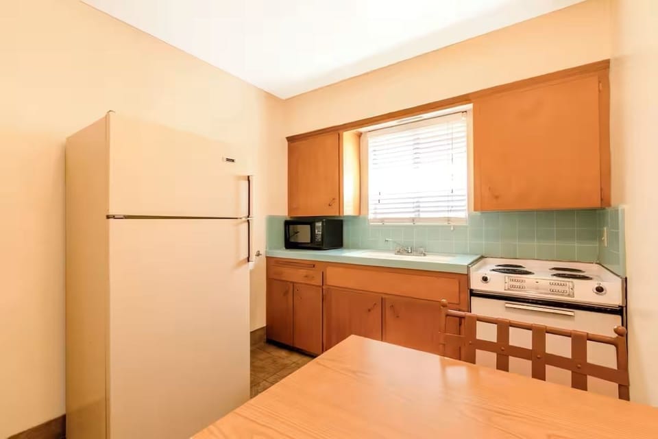 Cook simple meals easily with fridge, stove, and microwave.