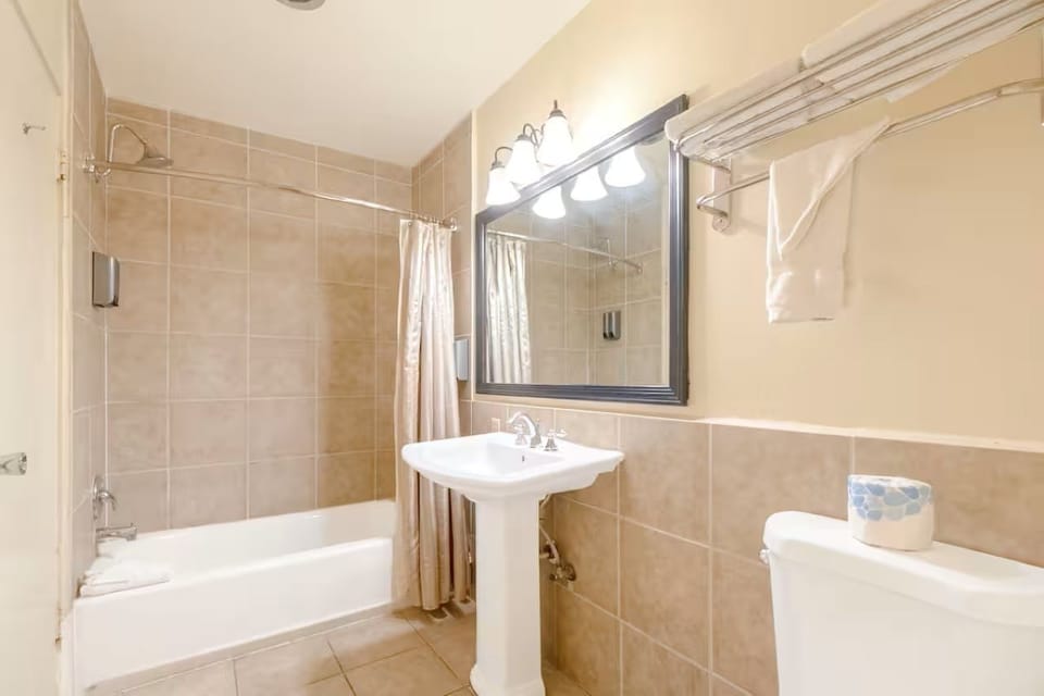 Refresh with a bright, spotless bath and shower-tub combo.
