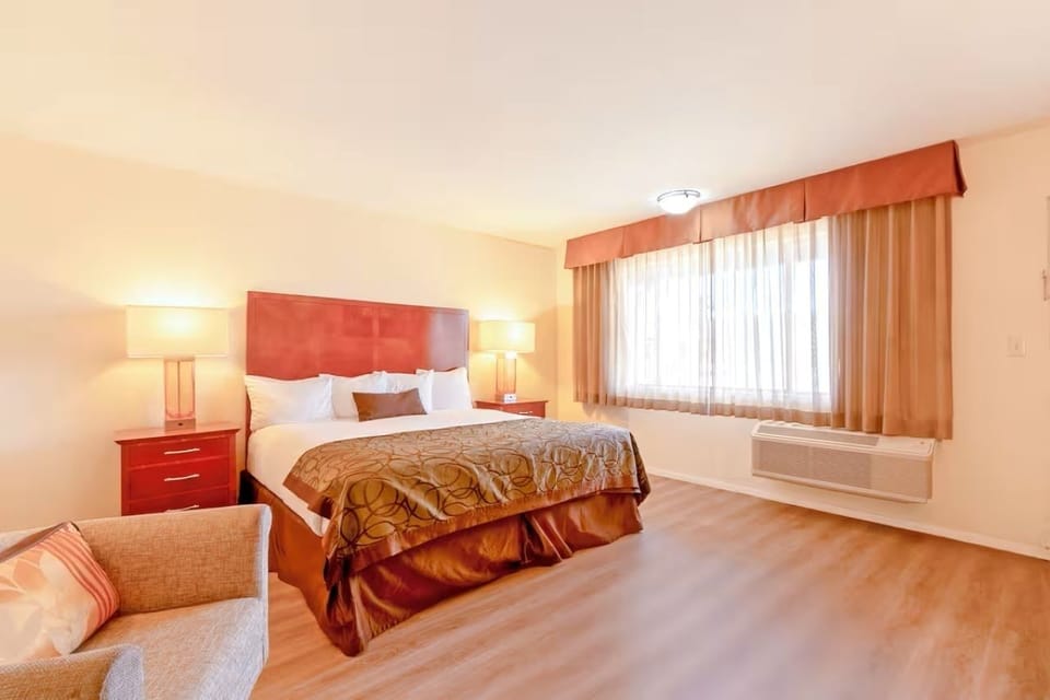 Wake up to soft daylight filtering through wide, breezy windows.